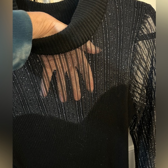 Worn once. Very flattering black stretchy dress with Sheer chest area. - Picture 3 of 9